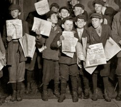 Washington, D.C. -- news of the Titanic and possible survivors. "After midnight April 17, 1912, and still selling extras, 12th Street near G. There were many of these groups of young newsboys selling very late these nights. Youngest boy in the group is Israel Spril (9 years old), 314 I Street N.W.; Harry Shapiro (11 years old), 95 L Street N.W.; Eugene Butler, 310 (rear) 13th Street N.W. The rest were a little older." Photo and caption by Lewis Wickes Hine. View full size.