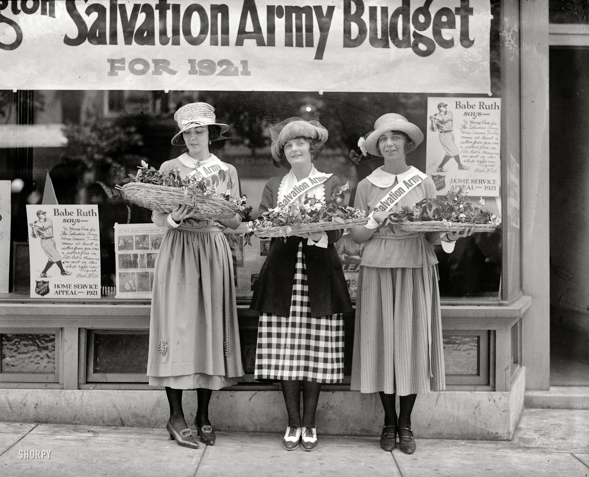 Washington, D.C., 1921. "Salvation Army House girls." Babe Ruth says: "A Home Run for the Salvation Army Home Service Fund means at least a dollar from you and a dollar from me. Let's bat a thousand per cent in this shop right now." National Photo Company Collection glass negative. View full size.