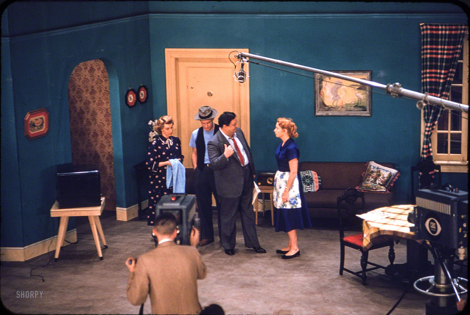 April 1955. "Art Carney, Jackie Gleason, Audrey Meadows, and Joyce Randolph performing skit on television sound stage for The Honeymooners." Color transparency from unpublished photos by Arthur Rothstein and Douglas Jones for the Look magazine assignment "Gleason's Pal Carney." View full size.