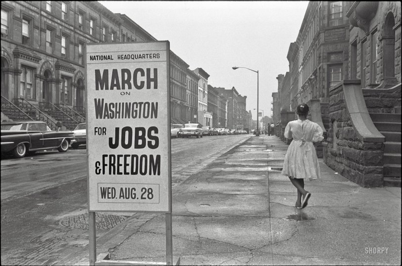 August 1963. "New York. Sidewalk sign outside the March on Washington headquarters building, 170 W. 130th Street." Photo by Werner Wolff for U.S. News &amp; World Report. View full size.
