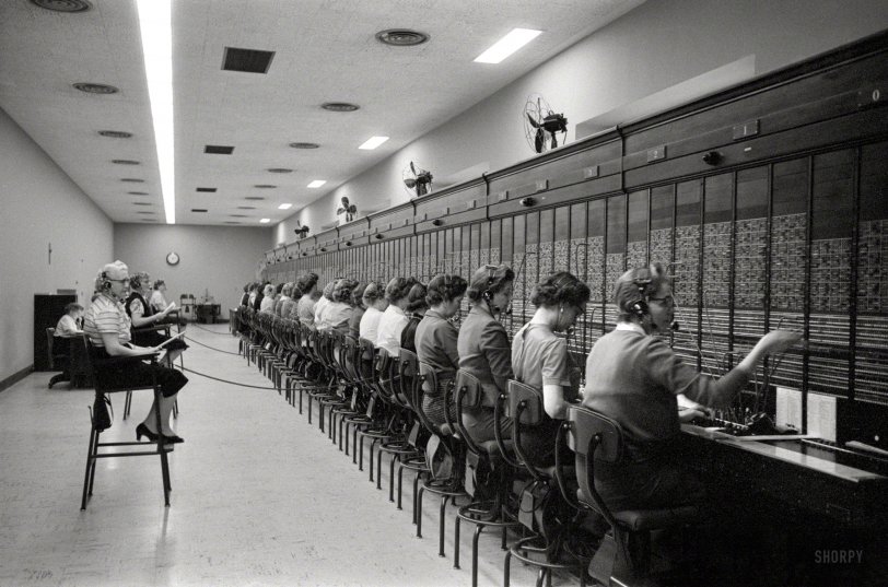January 27, 1959. Washington, D.C. "Women working at the U.S. Capitol switchboard. An average of 50,000 calls are placed through the board daily." Photo by Marion Trikosko for U.S. News &amp; World Report. View full size.
