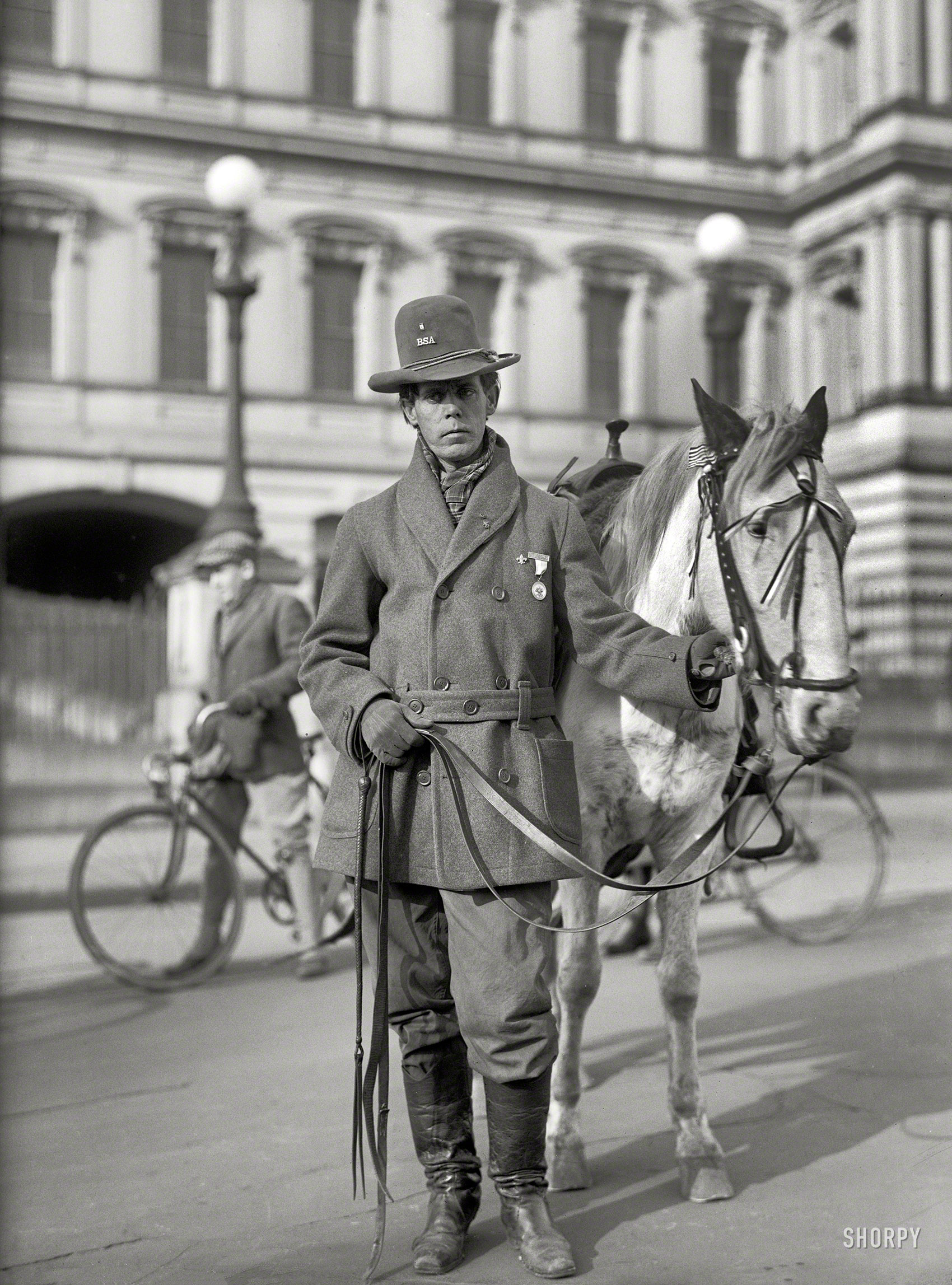 Red Fox James, a Blackfoot Indian, rode horseback from state to state seeking approval for a day to honor Indians. On Dec. 14, 1915, he presented the endorsements of 24 state governments at the White House. There is no record, however, of such a national day being proclaimed. (Library of Congress)

1915. "Indians, American. Red Fox James at White House." With the State, War and Navy building as backdrop. Harris & Ewing glass negative. View full size.