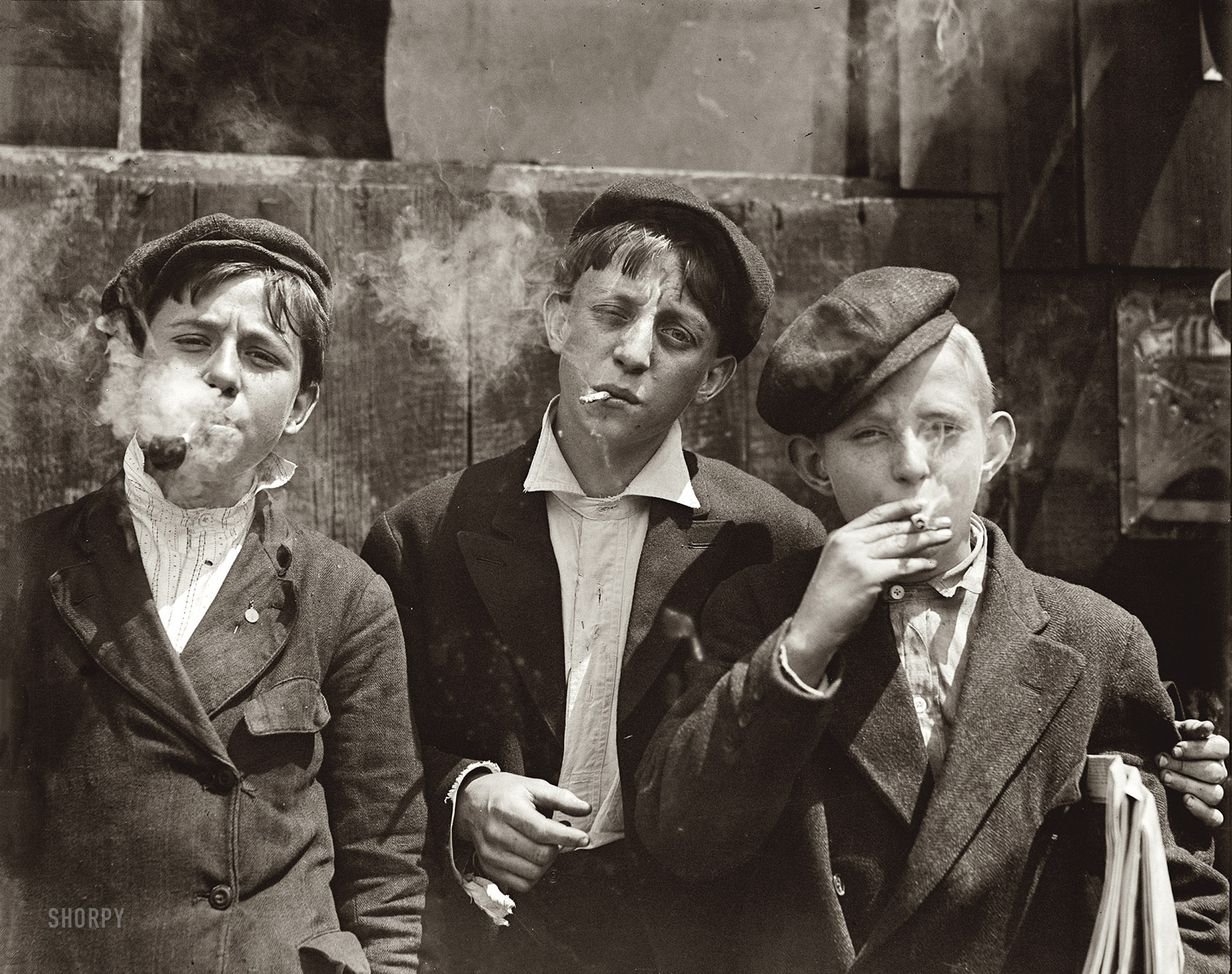 11 a.m. Monday, May 9, 1910. "Newsies at Skeeter’s Branch, Jefferson near Franklin, St. Louis." Photo by Lewis Wickes Hine. View full size.