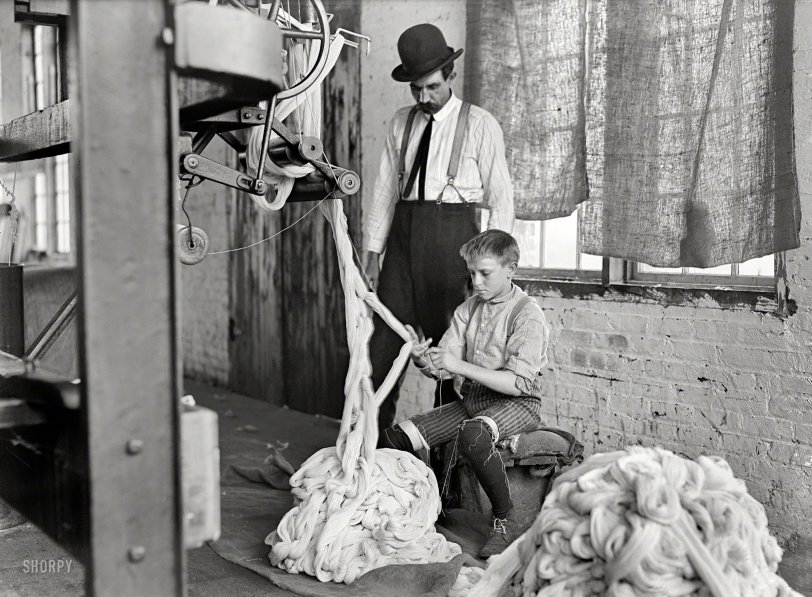 December 1908. "Boy at warping machine, Catawba Cotton Mill. Newton, North Carolina." Glass negative by Lewis Wickes Hine. View full size.
