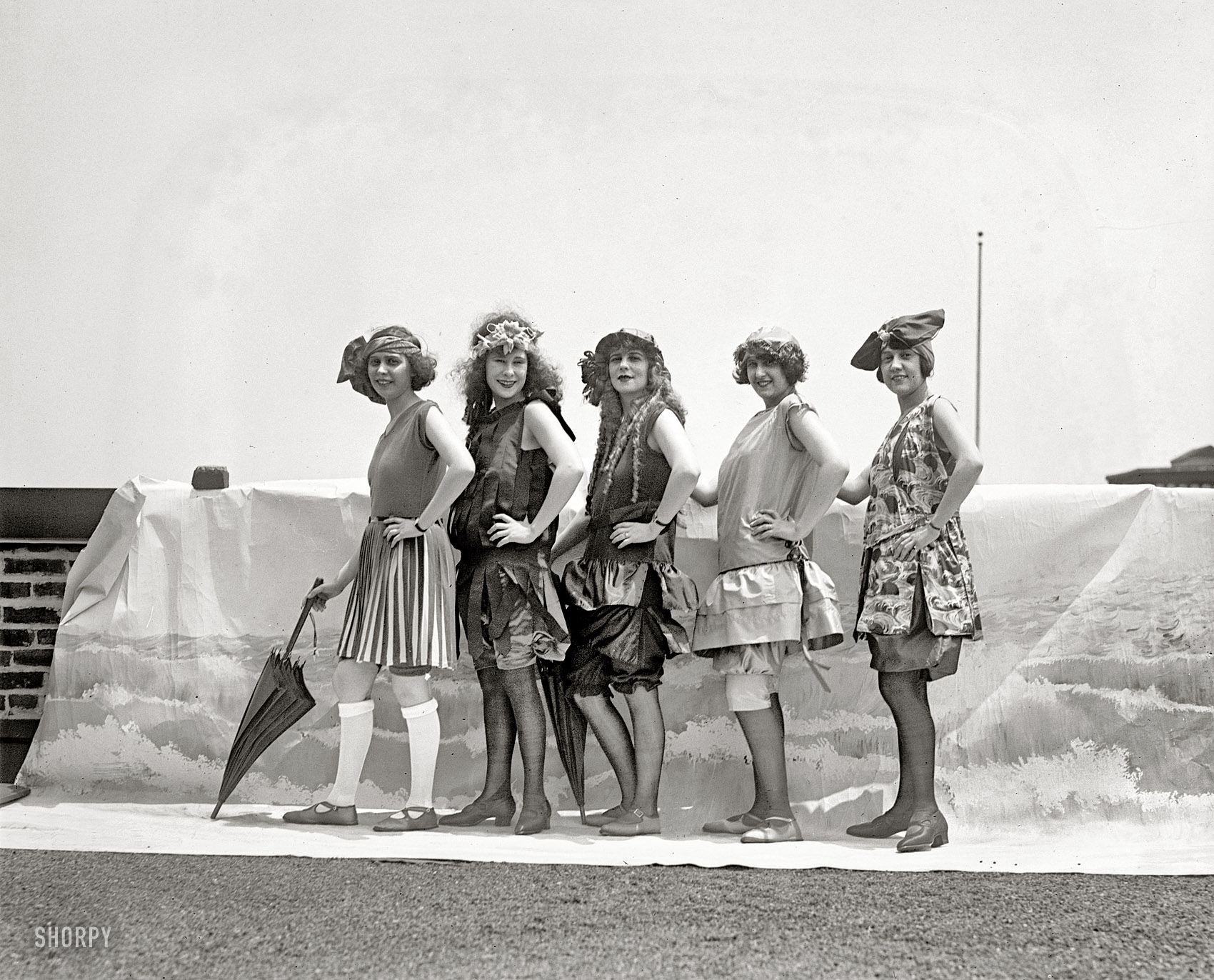 "Lansburgh Bathing Girls, 1922." Avert your eyes, gentlemen -- the leftmost lady's knees are showing. Next to her, Shorpy regulars will recognize Iola Swinnerton, winsome Washington beauty. National Photo glass negative. View full size.