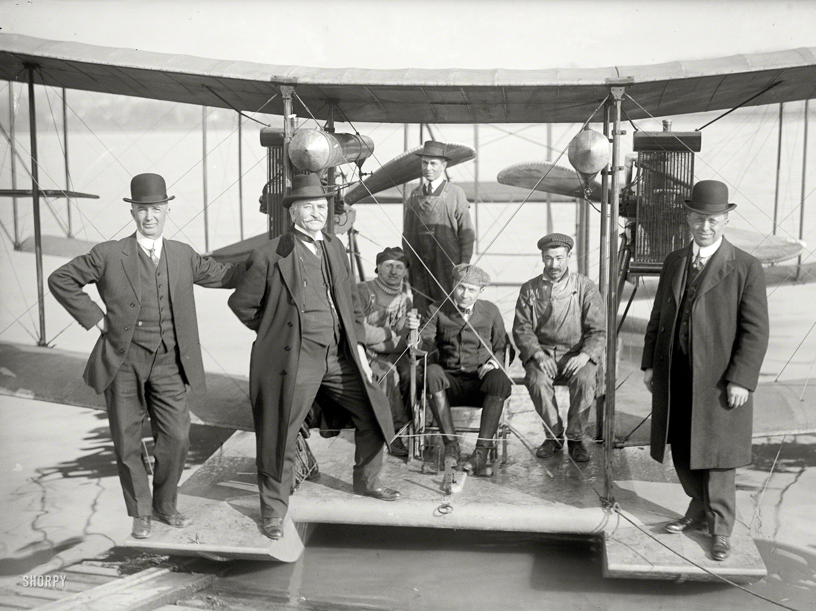 April 1916. Washington, D.C. "Richardson tandem biplane hydroplane on the Potomac. George A. Gray at controls. At left and right are Richardson brothers, who built the plane; 2nd from left is their uncle, whose idea it was." Harris & Ewing Collection glass negative. View full size.