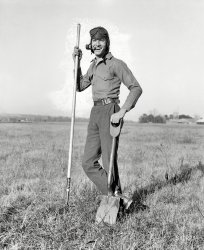 Washington, D.C., or vicinity circa 1923. "Joe Roberts." Out standing in his field. National Photo Company Collection glass negative. View full size.