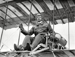 July 1910. New York. "Clifford B. Harmon seated in aeroplane." Aviator and land developer. 5x7 glass negative, Bain News Service. View full size.
