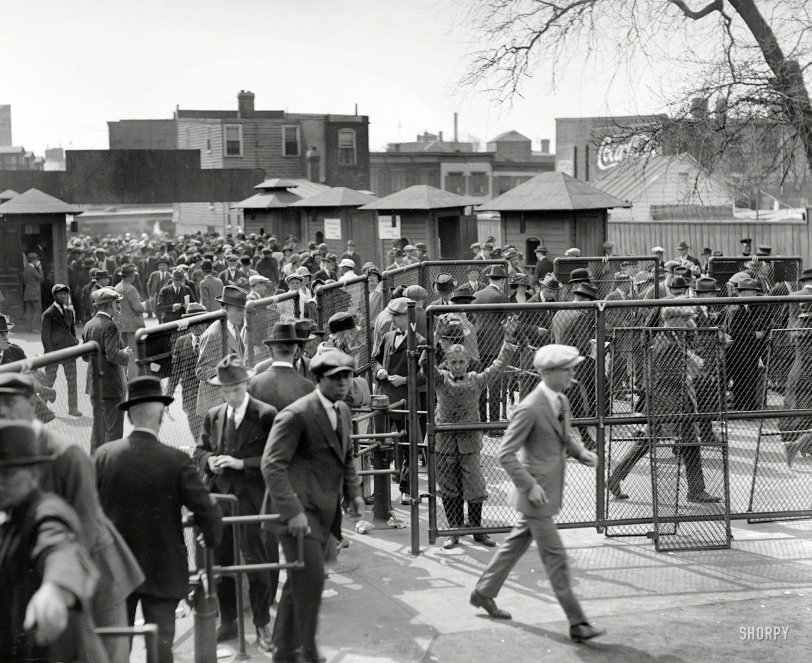 April 26, 1923. "Opening game." Washington's first game of the season at Griffith Stadium, where President Harding tossed out the ball and the Nats bested Philadelphia 2-1. National Photo Company glass negative. View full size.
