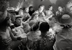 1953. "College students attending party with a tropical theme." Photo by Charlotte Brooks for the Look magazine assignment "Junior Hop." View full size.