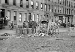 November 13, 1911. "New York streets during garbage strike." Note ashcans full of actual ashes. Bain News Service glass negative. View full size.