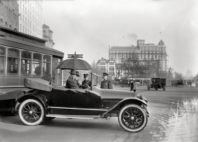 1917. "District of Columbia -- traffic Stop &amp; Go signs." From the birthplace of that musical genre, perhaps the earliest visual representation of "go-go." Raleigh Hotel in the background. Harris &amp; Ewing Collection glass negative. View full size.
