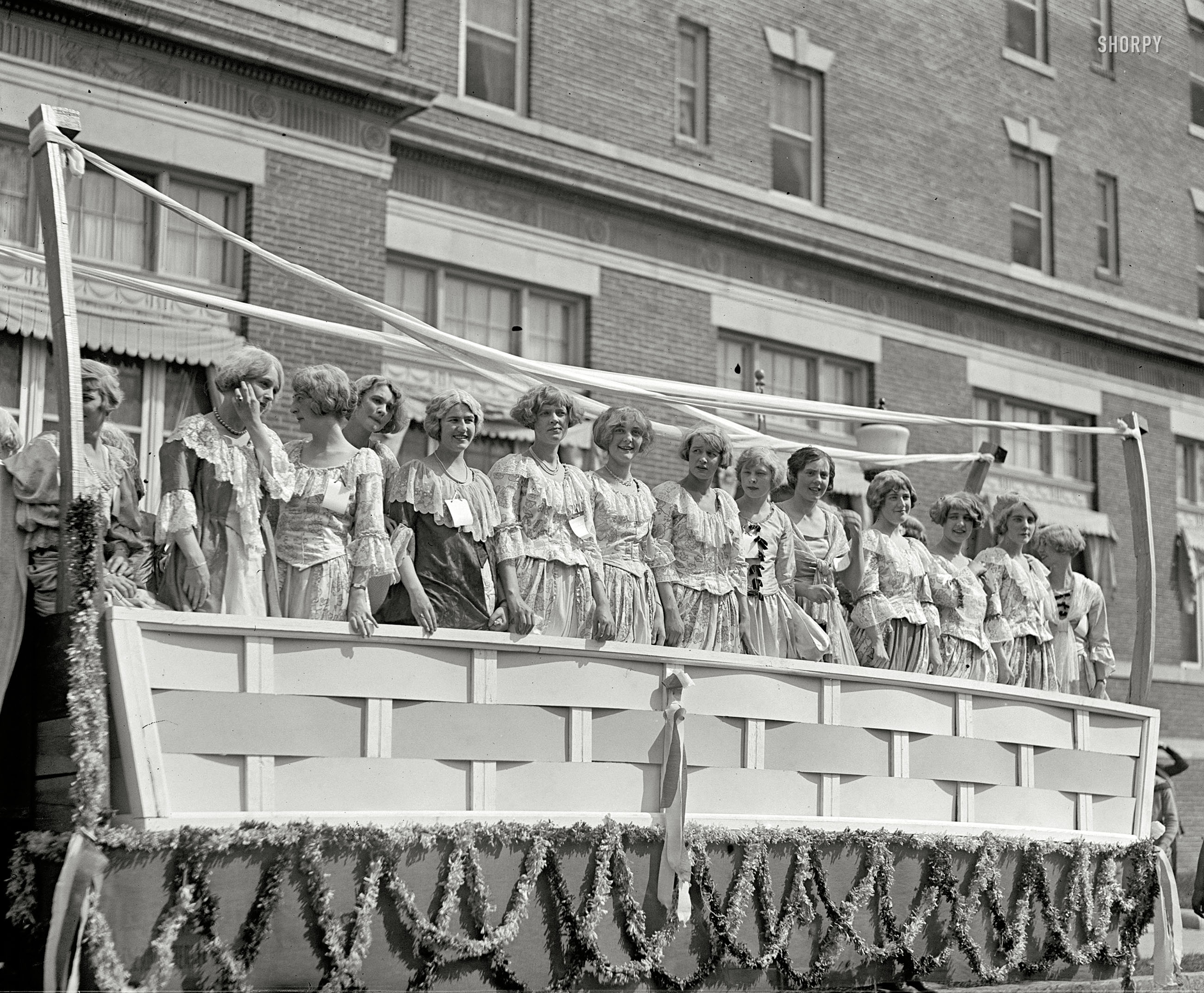 April 25, 1925. "Apple Blossom Festival, Winchester, Virginia." A freshly picked bevy of beauties. National Photo Company glass negative. View full size.