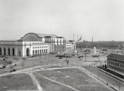 Washington, D.C., circa 1917. "Union Station." In the distance, a glimpse of a long-vanished Capitol Hill landmark, the Washington Brewery smokestack advertising SPARKLING ALE. Harris & Ewing glass negative. View full size.