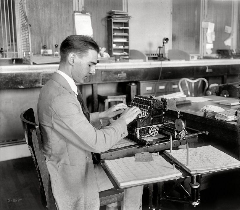 Washington, D.C., circa 1920. "Post Office money order machine." A sort of typewriter-cash register hybrid. Harris & Ewing glass negative. View full size.