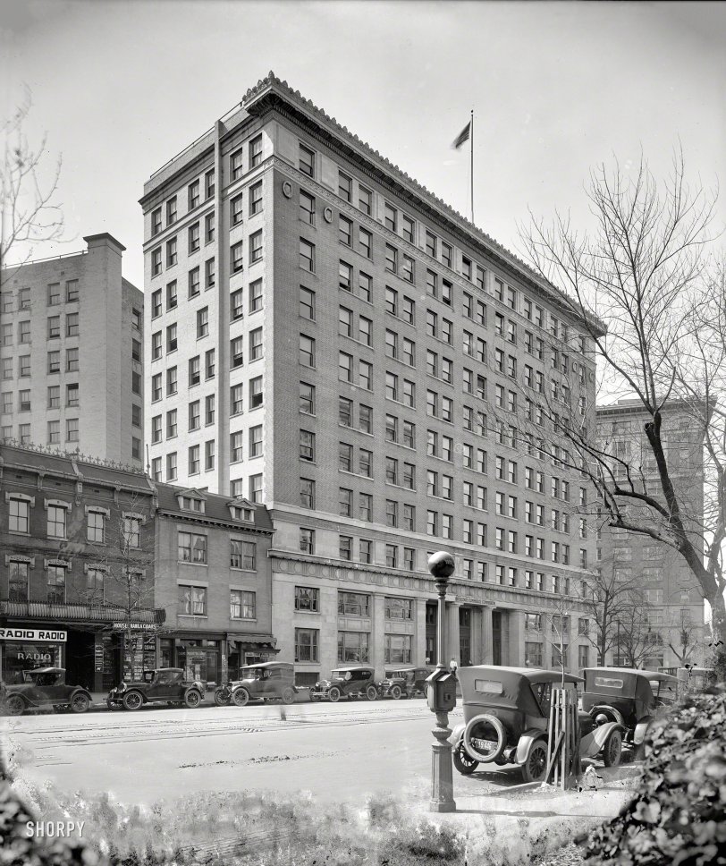 Washington, D.C., 1924. "Interstate Commerce Commission building." Two doors down from the Jazz Age equivalent of the Apple Store. Note police call box with Bat Signal globe. Harris &amp; Ewing Collection glass negative. View full size.
