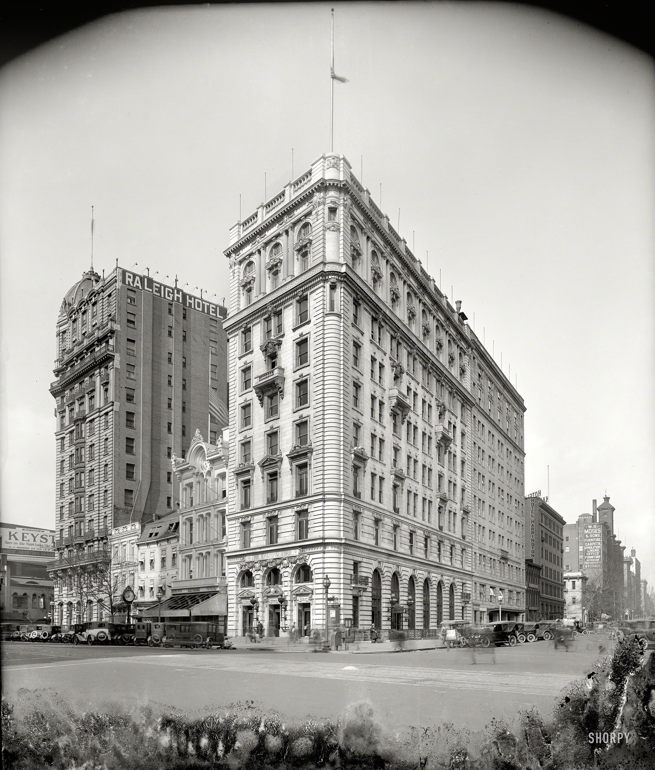 Washington, D.C., 1924. "Evening Star building." Offices of the Washington Evening Star newspaper next to the Raleigh Hotel on Pennsylvania Avenue between 11th (on the right) and 12th streets. Where there seems to be something of a mold problem. Harris & Ewing Collection glass negative. View full size.