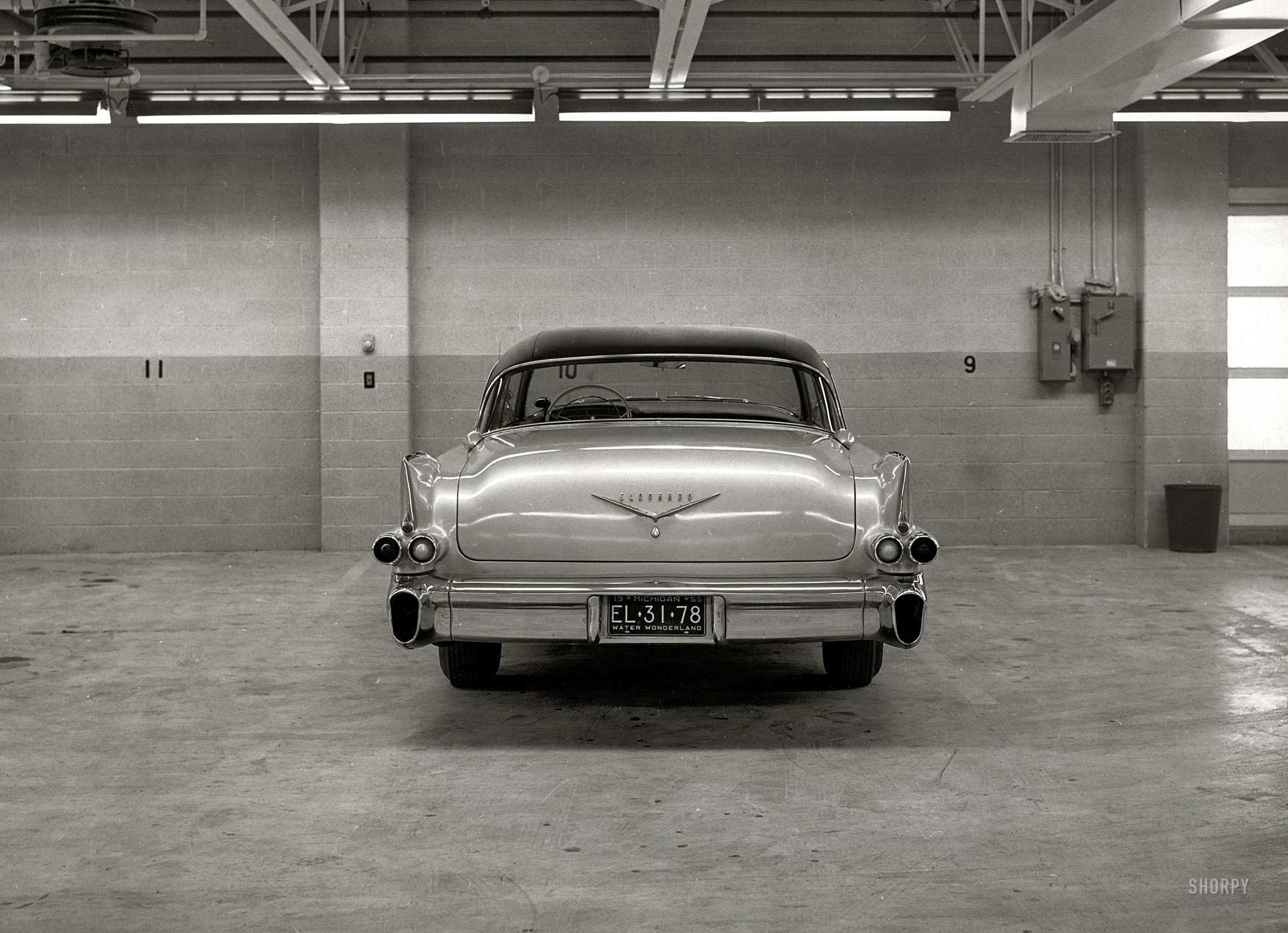 A 1956 Cadillac Eldorado Seville photographed in 1955. From a series of 8x10 glossies with an ink stamp on the back reading "Styling Department, Ford Motor Company, Dearborn Mich." Keeping an eye on the competition. View full size.