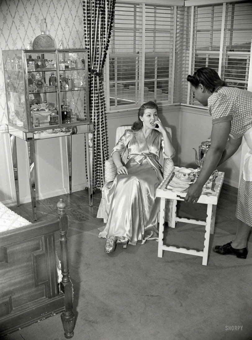 1940. "Lana Turner being served coffee on a tray in her Beverly Hills home." Is there the germ of a screenplay here? Photo by Earl Theisen for the Look magazine article "Lana Turner and Artie Shaw at Home." View full size.
