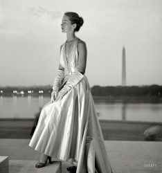 June 1949. "Fashion model posing in evening gown on the steps of the Jefferson Memorial against backdrop of Tidal Basin and Washington Monument." Photo by Toni Frissell, of "Floating Lady" fame. View full size.