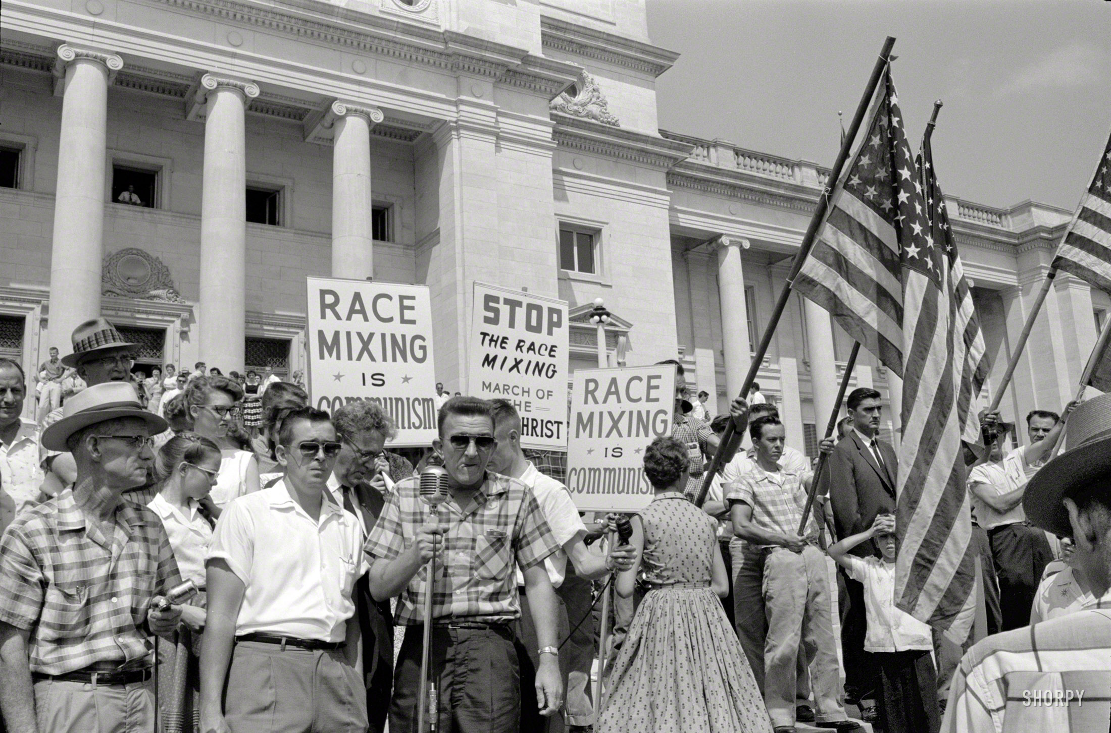 August 20, 1959. There was no Twitter in 1959, but you could carry a sign around. "Little Rock, Arkansas. Rally at State Capitol. Group protesting admission of the 'Little Rock Nine' to Central High School." Photo by John T. Bledsoe. U.S. News & World Report Photograph Collection, Library of Congress. View full size.