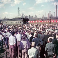 Sept. 17, 1952. "Presidential candidate Dwight Eisenhower speaking to a crowd at a whistle-stop event near a steel mill." Medium format color transparency by Charlotte Brooks for Look magazine. View full size.