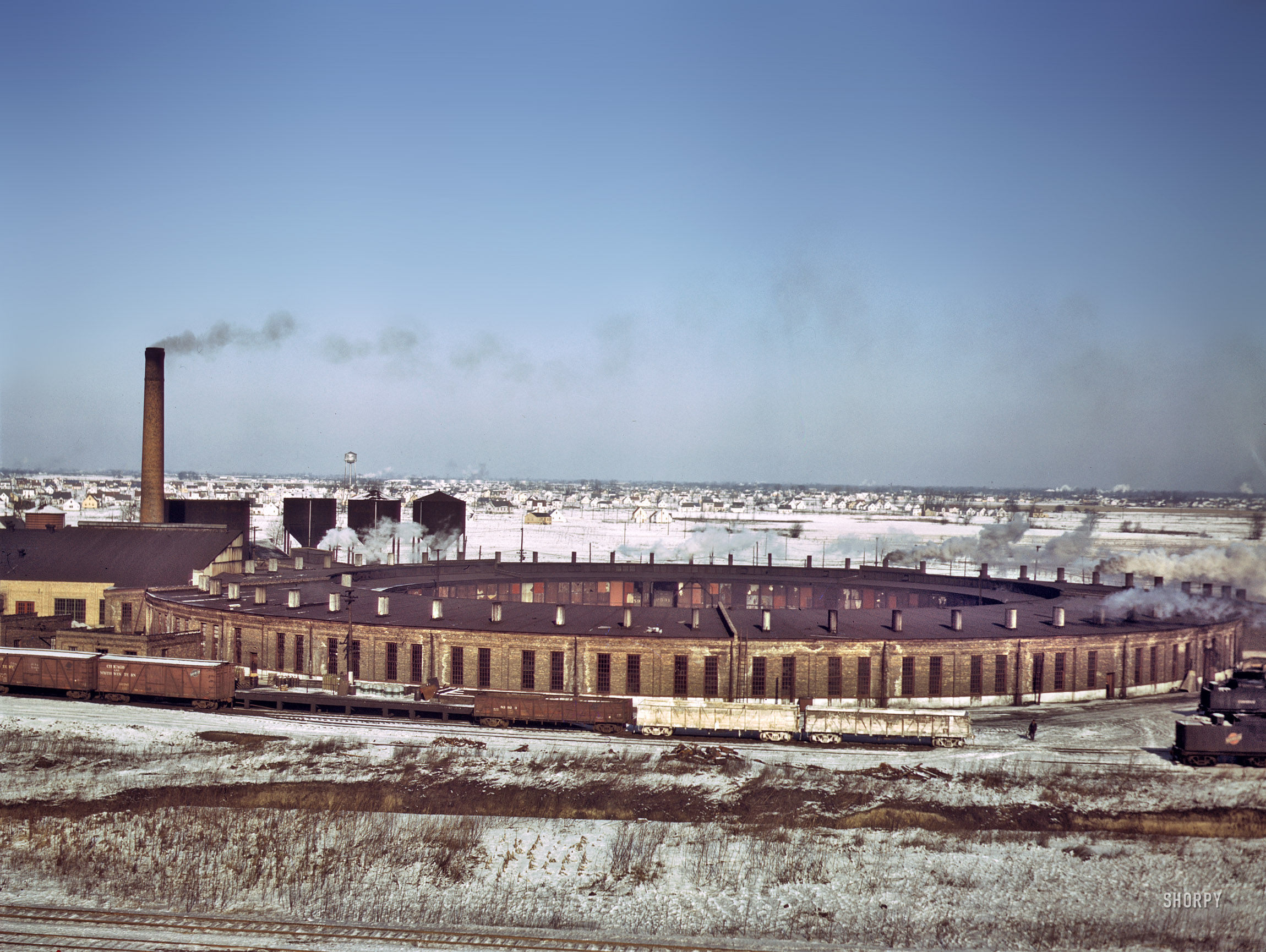 December 1942. "Proviso Yards, Chicago. A Chicago & North Western Railroad roundhouse." 4x5 Kodachrome transparency by Jack Delano. View full size.