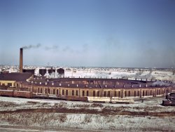 December 1942. "Proviso Yards, Chicago. A Chicago & North Western Railroad roundhouse." 4x5 Kodachrome transparency by Jack Delano. View full size.