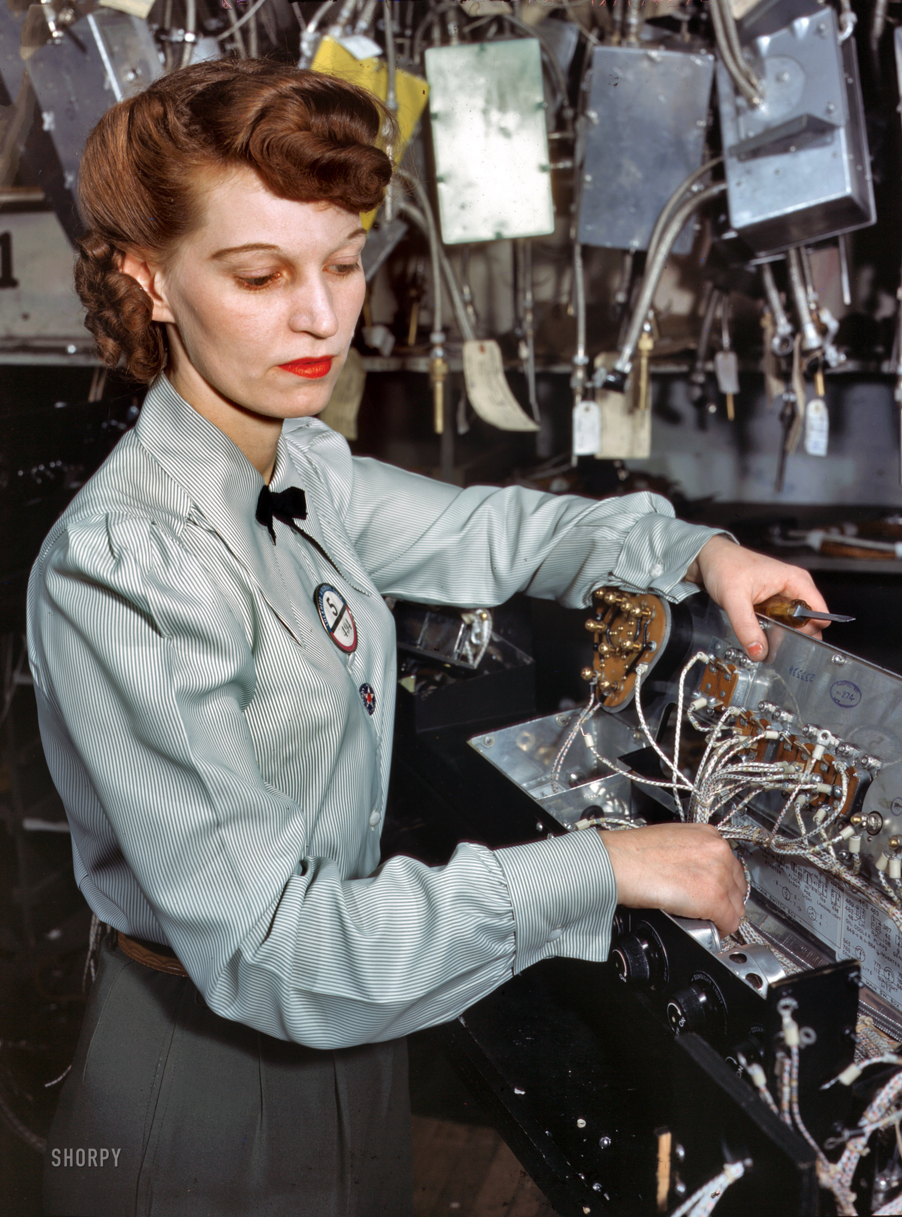 December 1941. "Electronics technician, Goodyear Aircraft Corp., Akron, Ohio." 4x5 Kodachrome transparency by Alfred Palmer, OWI. View full size.