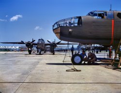 October 1942. "New B-25 bombers lined up for final inspection and tests at the North American Aviation plant in Kansas City, Kansas." 4x5 Kodachrome trans&shy;parency by Alfred Palmer for the Office of War Information. View full size.