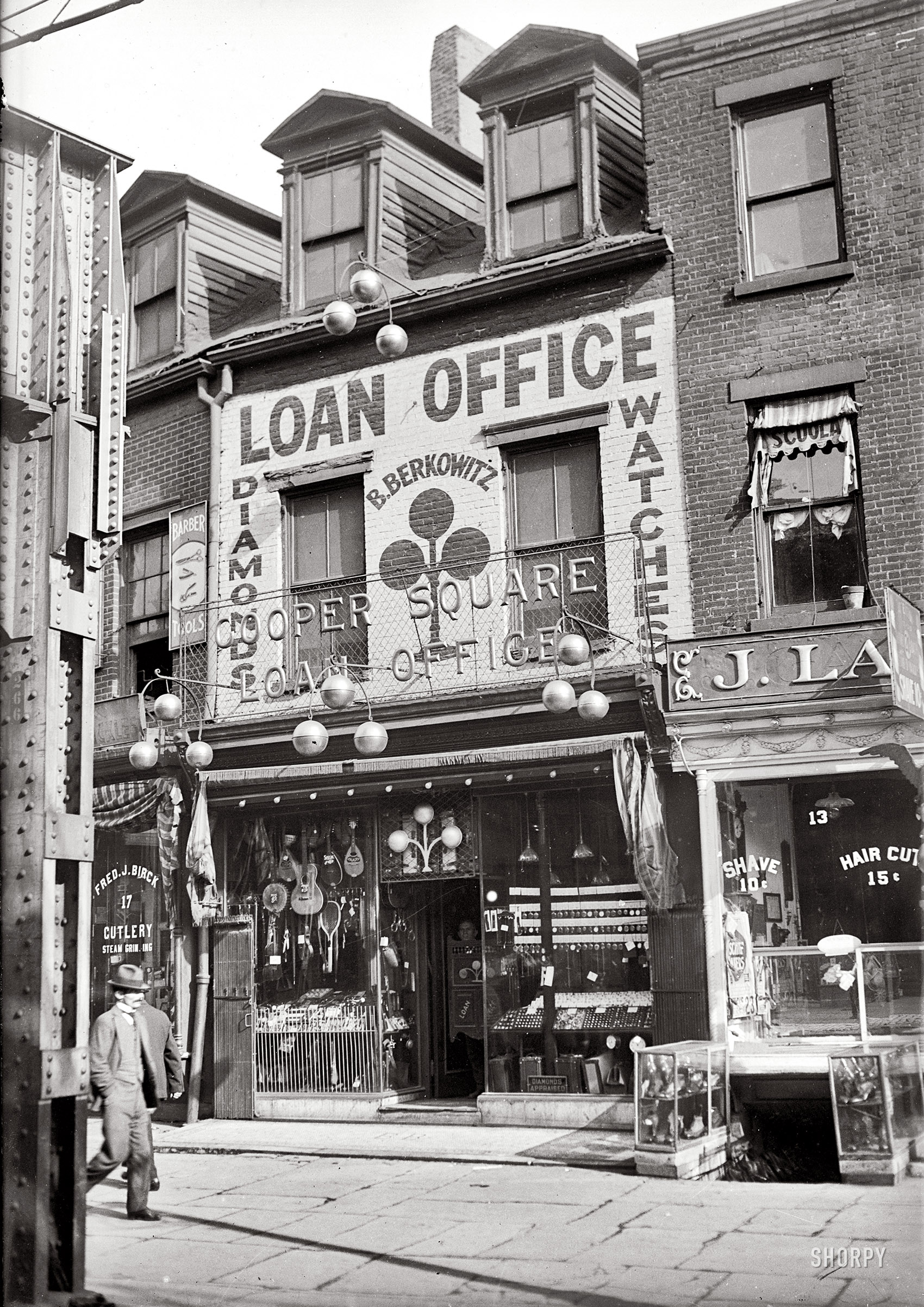 A pawn shop at No. 15 Cooper Square (thanks, Evan) in New York circa 1920. 5x7 glass negative, George Grantham Bain Collection. View full size.