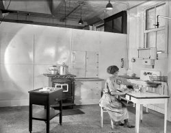 September 6, 1922. Washington, D.C. "Miss Elizabeth U. Hoffman." Last spied here four years ago, Miss H. is still stuck in this institutional-looking kitchen. National Photo Company Collection glass negative. View full size.