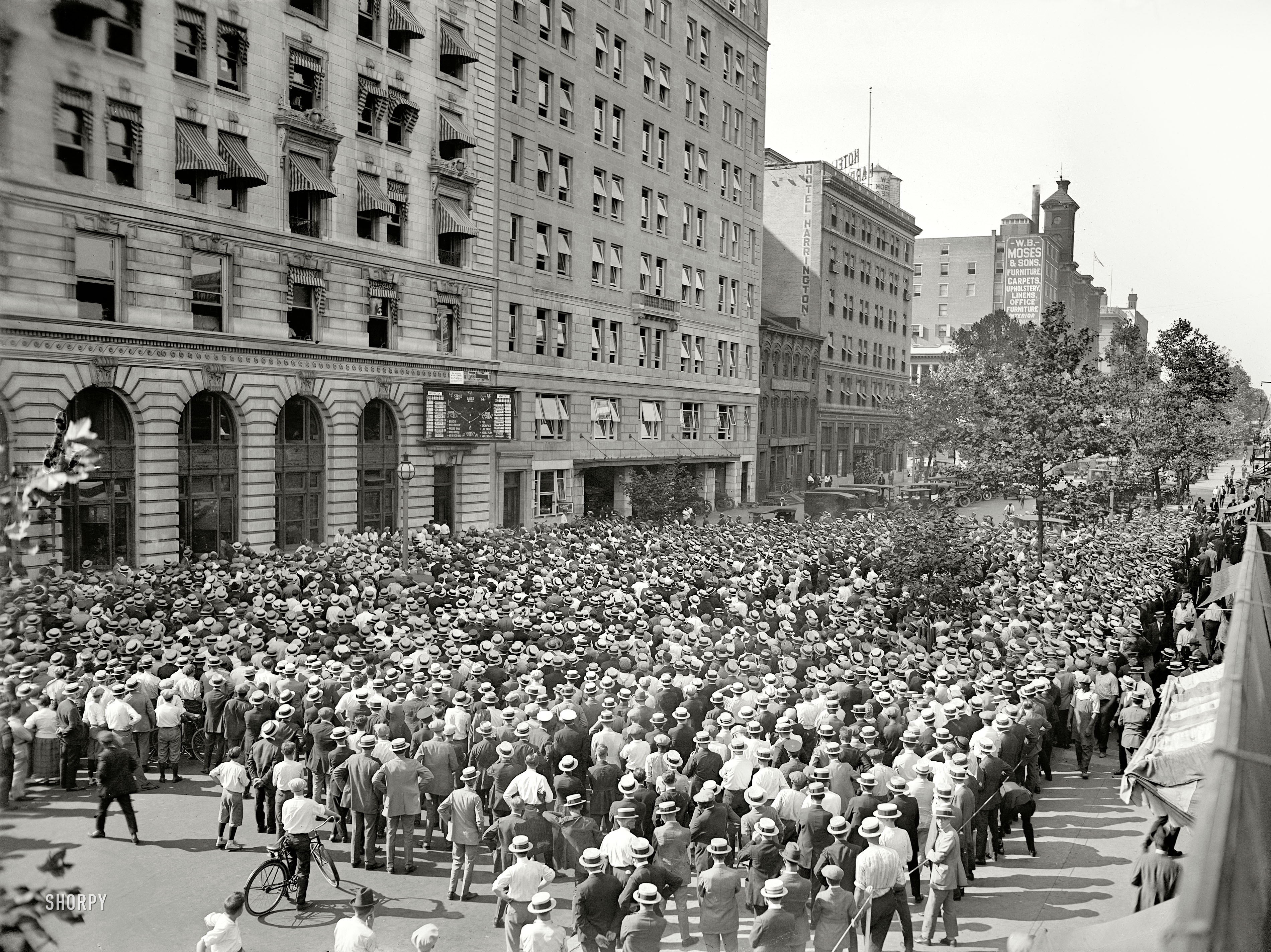 August 29, 1924. "Crowd at Washington Star scoreboard for A.L. Pennant game, Nationals-New York." The Nats beat the Yankees 5-1. A demonstration of the 1920s mania for baseball (and the straw boater), at just about the time radio was making mechanical scoreboards obsolete. National Photo Co. View full size.