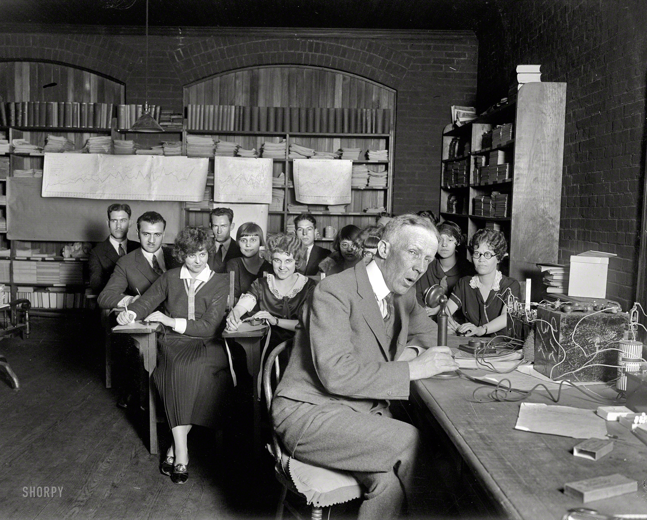 April 2, 1925. "Experiment at Gallaudet College by Prof. R.H. Gault." Last seen here, the Professor was attempting to "enable the deaf to understand what is said to them by feeling words with their fingers." National Photo Co. View full size.