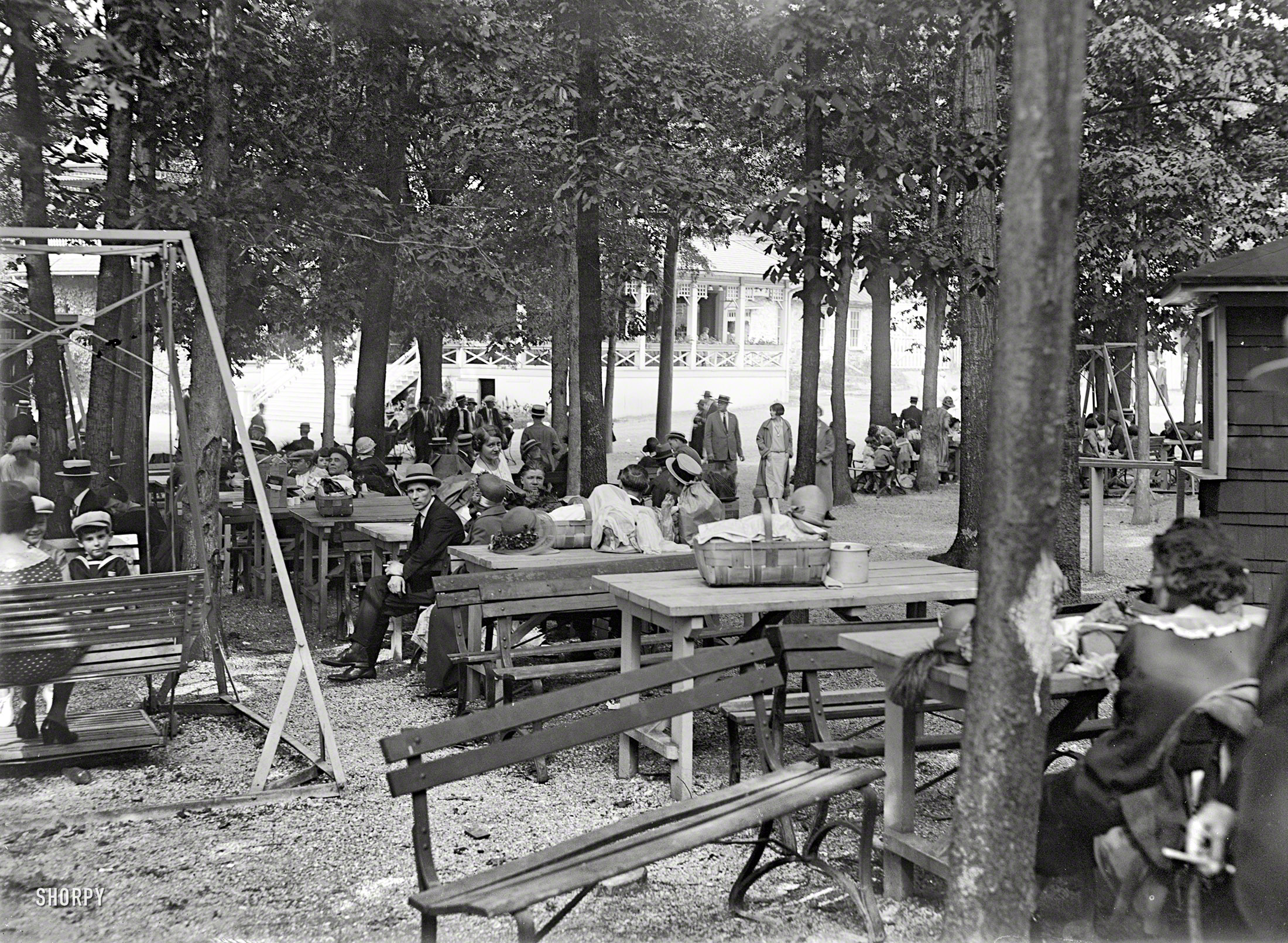 1925. "Glen Echo Park Co." Picnic tables at the Montgomery County, Maryland, amusement park. National Photo Company glass negative. View full size.