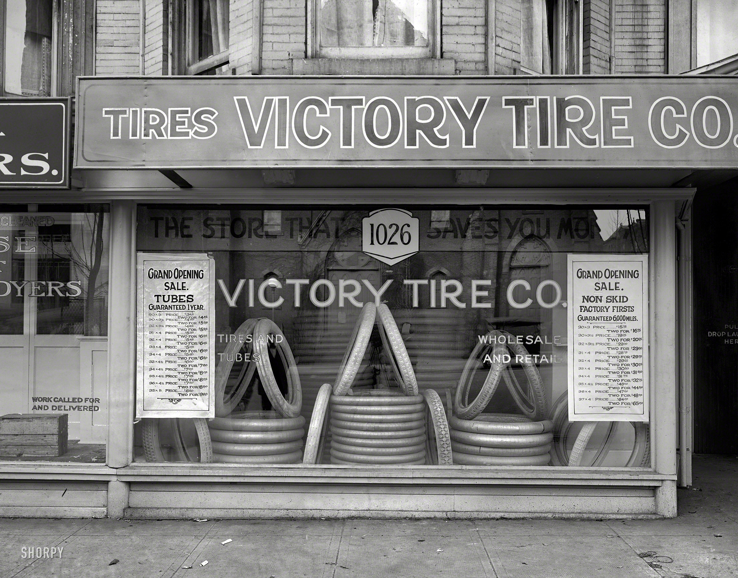 Washington, D.C., circa 1920. "Victory Tire Co., 14th Street N.W." Guaranteed 6,000 miles! National Photo Company glass negative. View full size.