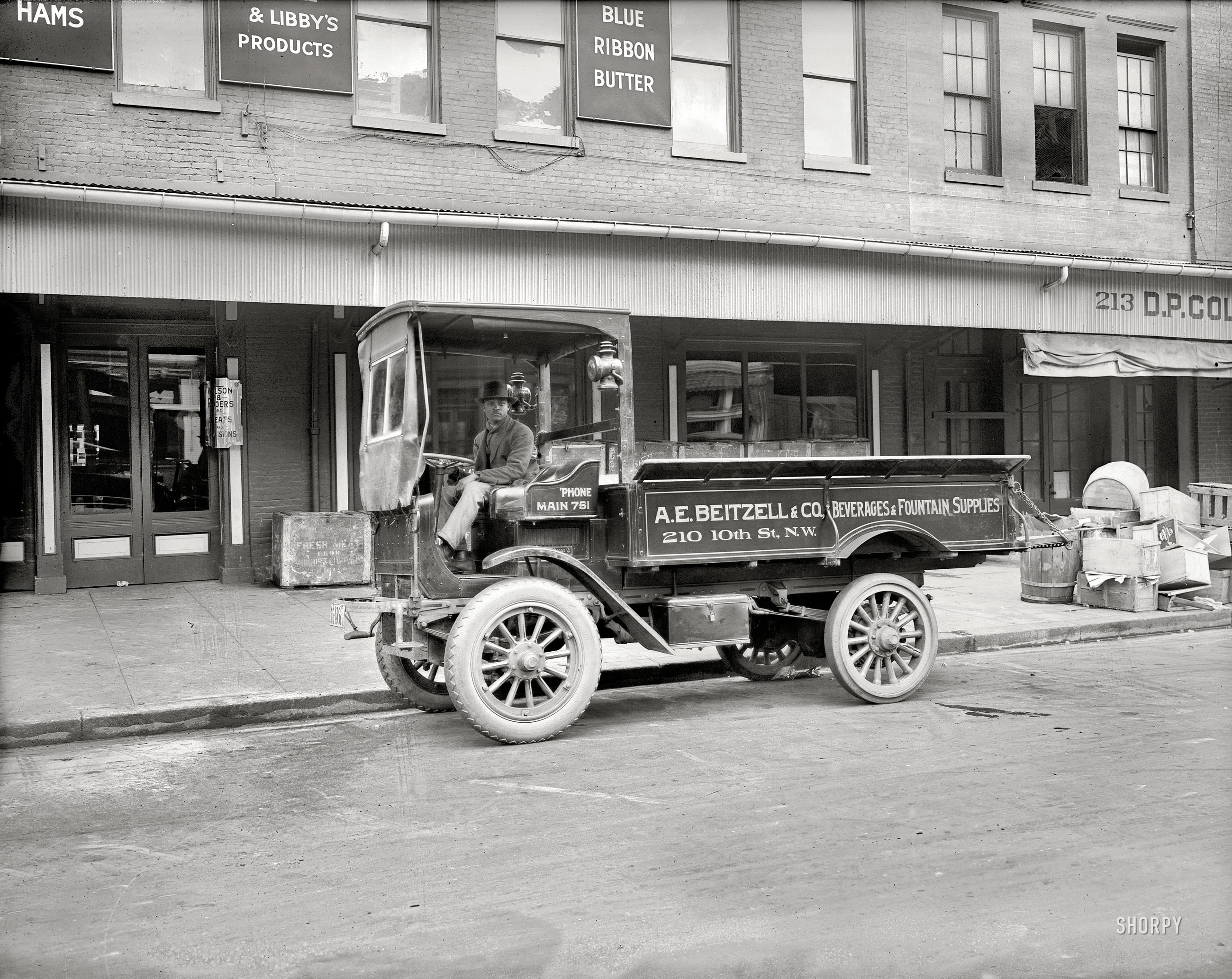 Washington, D.C., circa 1920. "A.E. Beitzell & Co. -- Autocar truck." Pneumatic up front, solid rubber in the back. National Photo Co. glass negative. View full size.