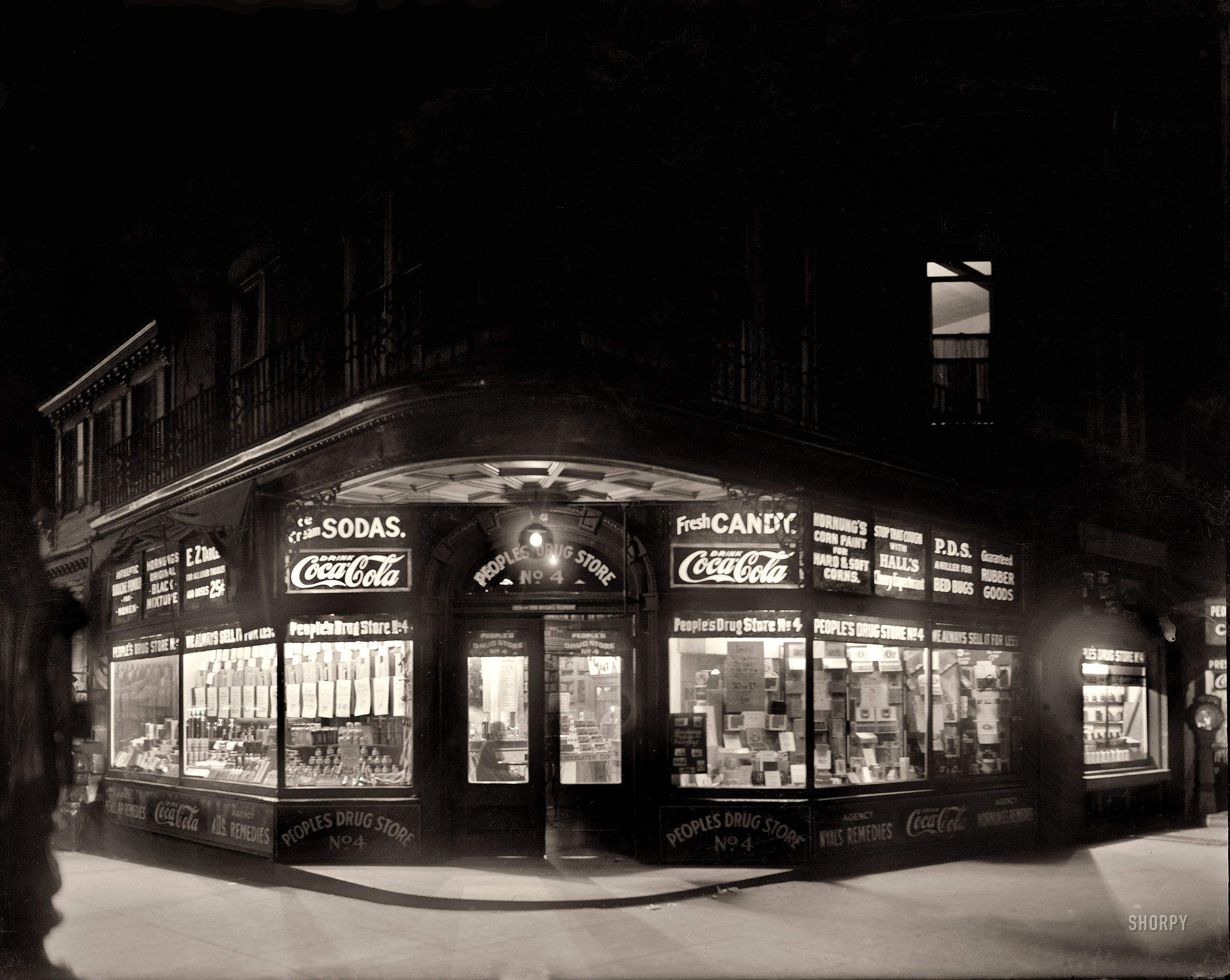 Washington, D.C., circa 1920. "People's Drug Store, 7th and M." Your head&shy;quarters for Bed Bug Killer, Corn Paint ("for Hard and Soft") and the ever-popular Rubber Goods. National Photo Company glass negative. View full size.