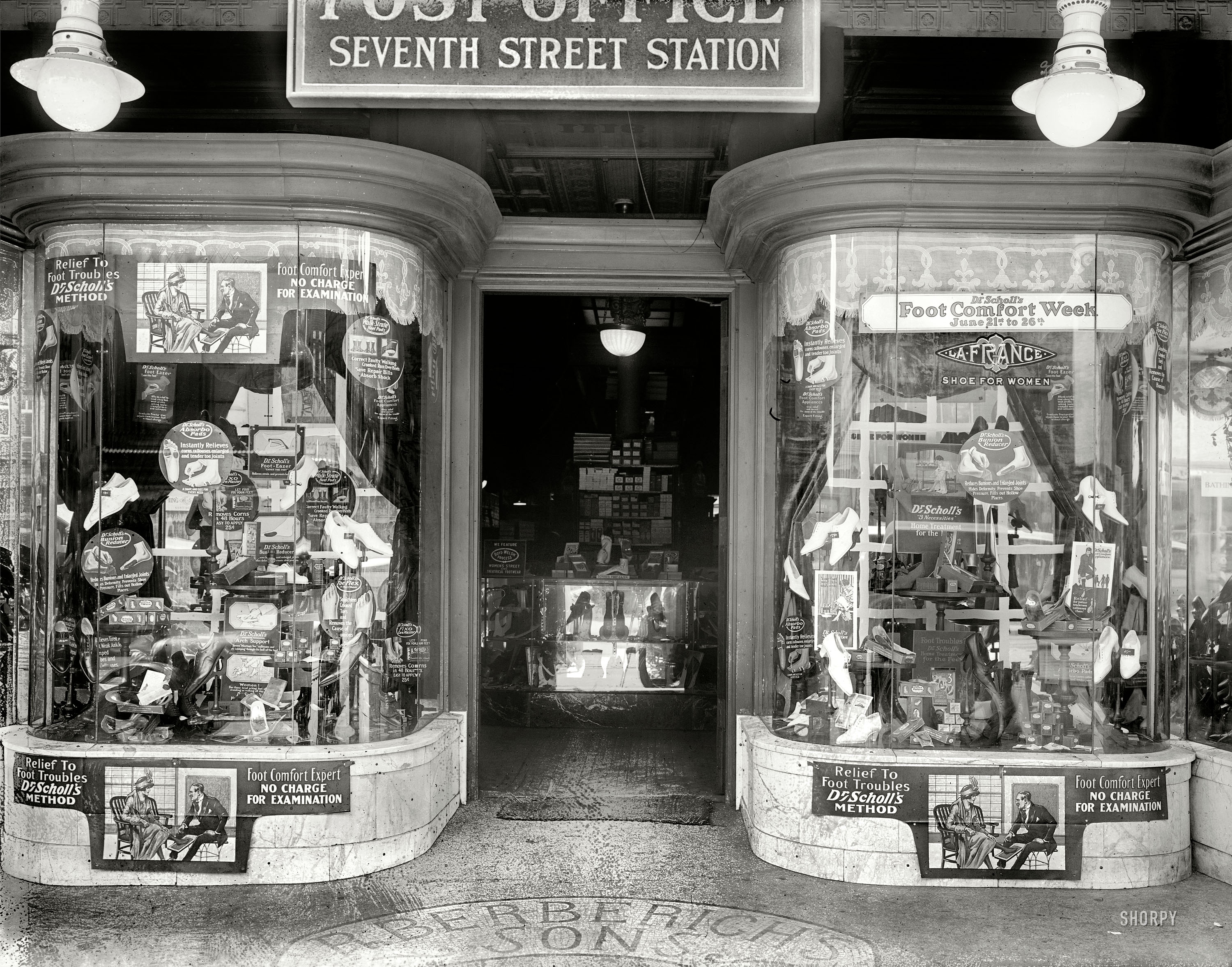 June 1920. "Berberich store window, Seventh Street." The venerable Washington, D.C., shoe emporium. In the era of confining footwear, bunions, corns and calluses, it was Dr. Scholl to the rescue. National Photo Co. View full size.