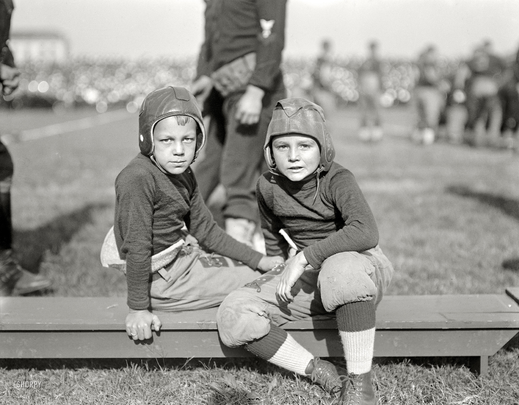 October 1922. "Football." Two little leatherheads at the Navy-Georgia Tech game in Annapolis. Harris & Ewing Collection glass negative. View full size.