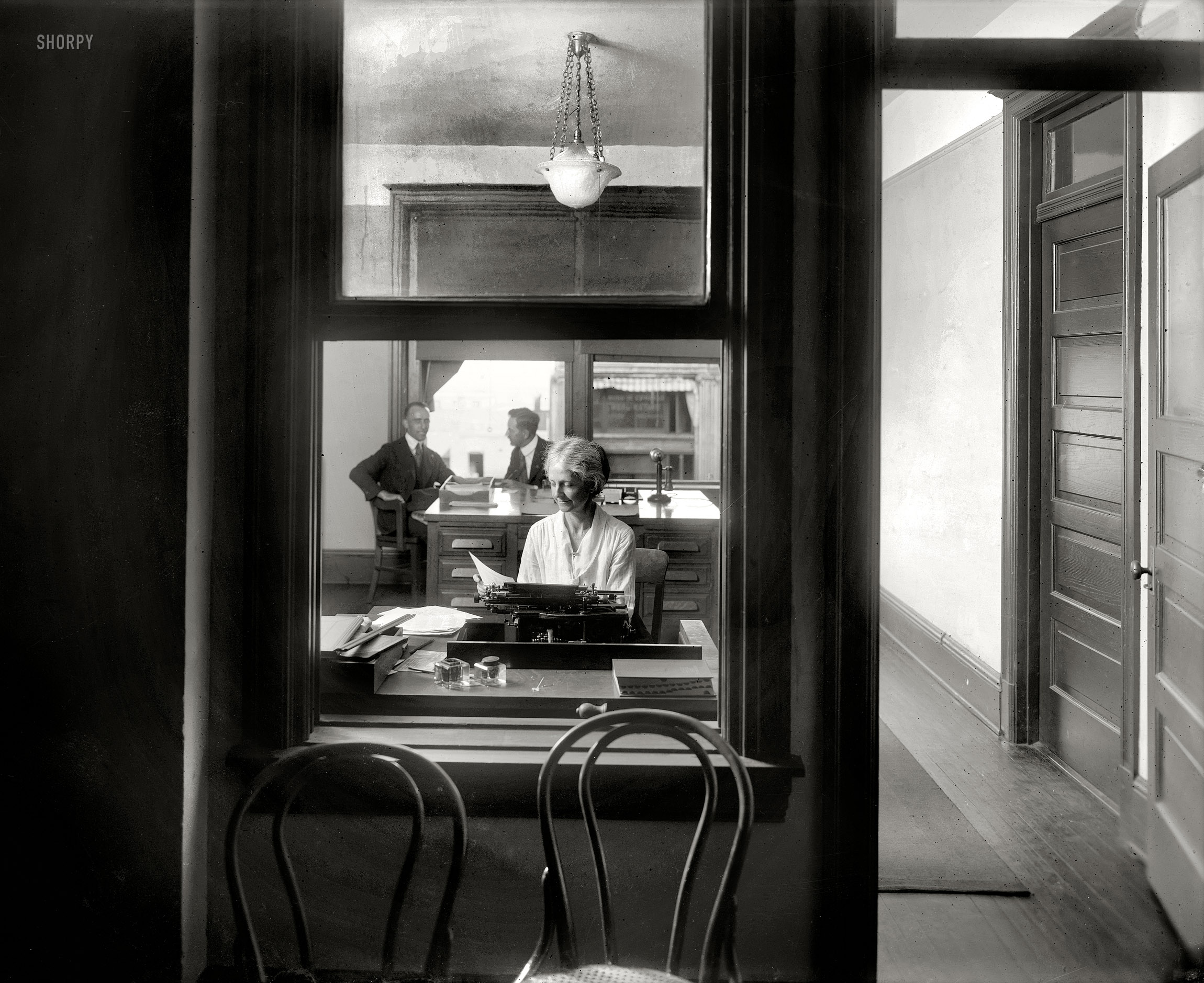 Washington, D.C., circa 1920. "National Personnel Service Bureau." This could be a shot composed by Edward Hopper.  National Photo Co. View full size.