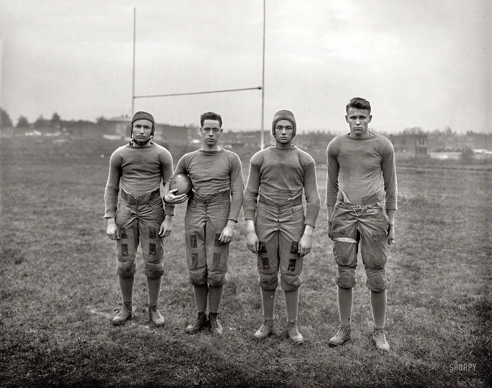 Washington, D.C., 1920. "Gripp, Mathew, [Nathan] Lahn, Troske -- Gallaudet U." Gridiron stars of the first college for the deaf, credited with inventing the football huddle in the 1920s as a way to keep its signed plays secret. View full size.