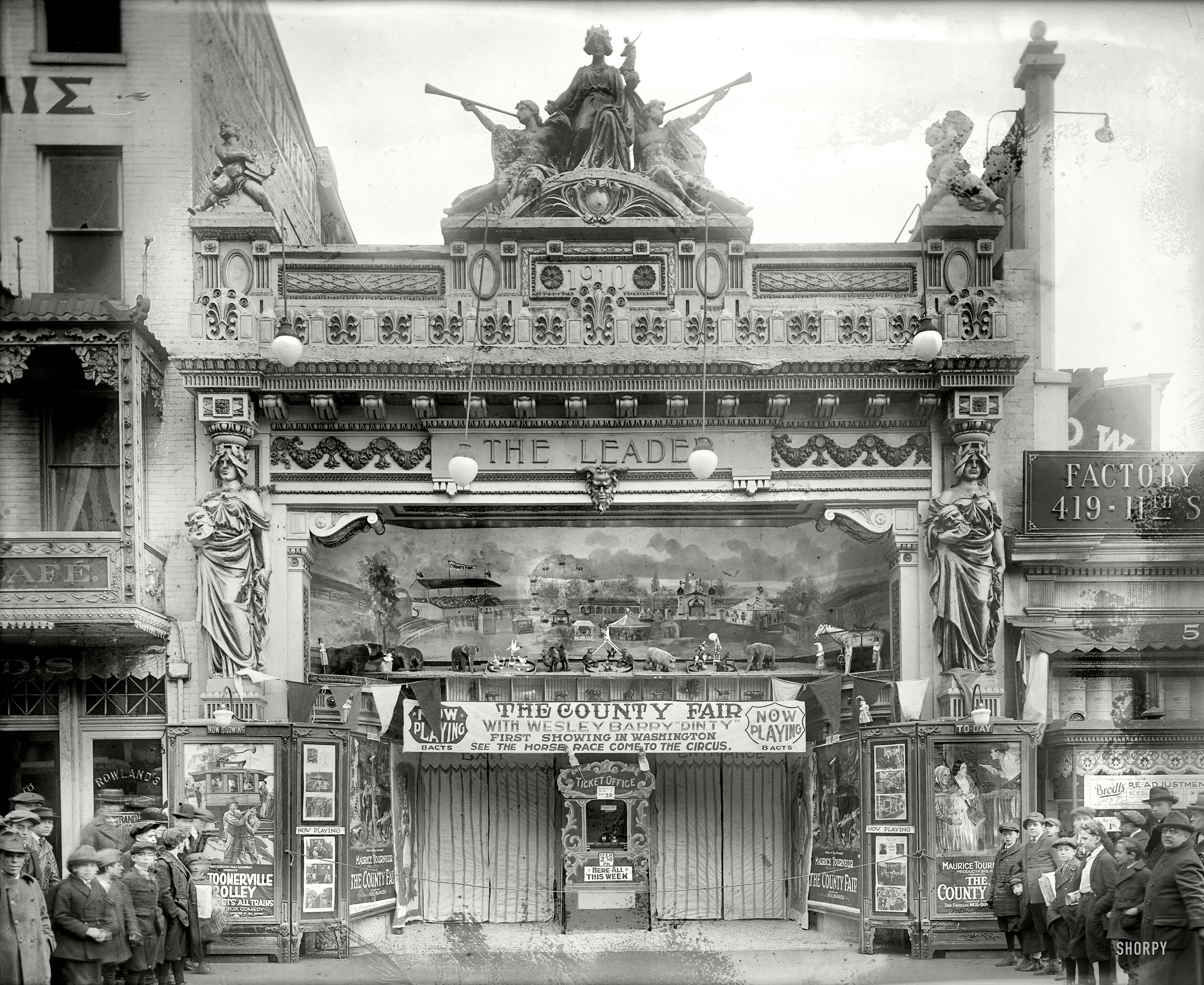 Washington, D.C., 1921. "Sidney Lust's Leader Theater." Now playing: "The County Fair," with a nifty diorama. National Photo Co. View full size.