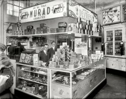 Washington, D.C., circa 1921. "People's Drug Store, 7th and K Streets." Expert advice given on pipes, cigars, flashlights and cameras. View full size.