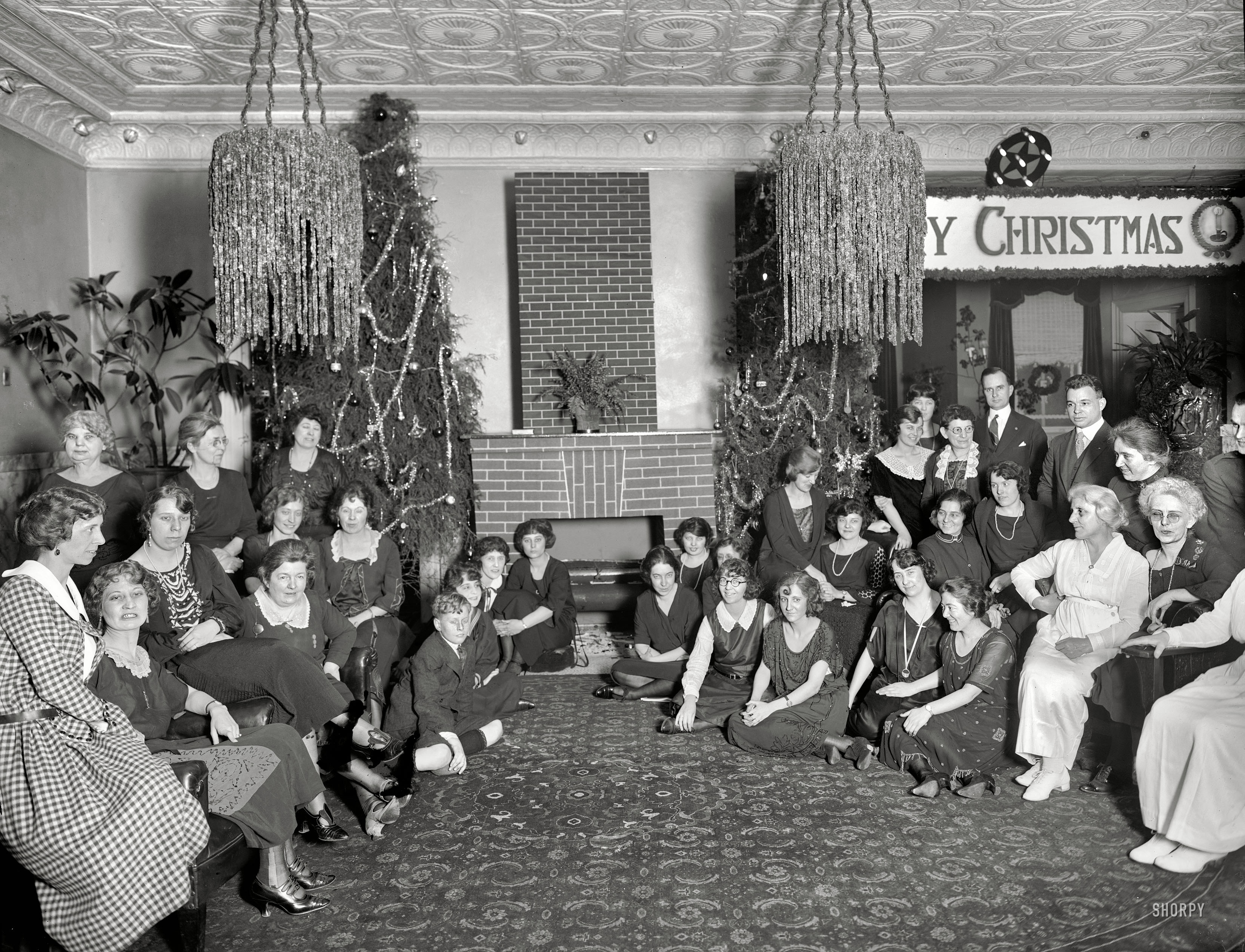 Washington, D.C., circa 1921. "Salvation Army Christmas group." Happy faces bathed in the flattering glow of the magnesium flash. View full size.