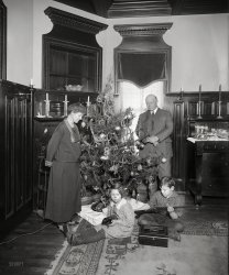 Washington, D.C., circa 1922. "Denby Christmas tree." Junior remembers this as the best Christmas ever! His gun-giving dad is Secretary of the Navy Edwin Denby. National Photo Company glass negative. View full size.