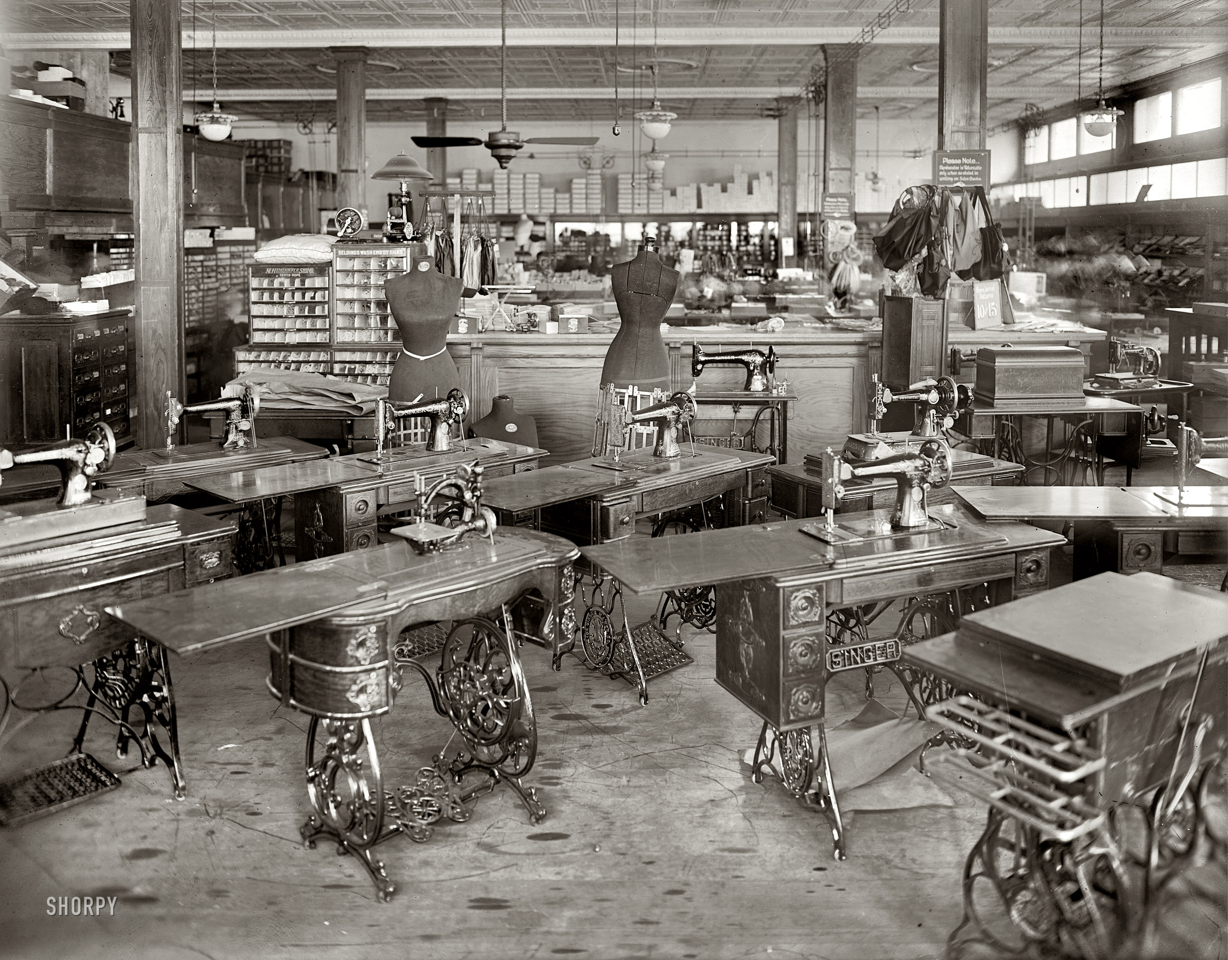 Washington, D.C., circa 1919. "Oppenheimer's dress shop." Haunted by a few spectral customers. National Photo Company glass negative. View full size.