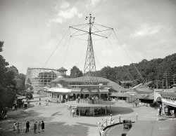 Montgomery County, Maryland, circa 1928. "Glen Echo Park." Another look at this old-school attraction in the Washington suburbs. View full size.
Play Station ZeroThe Penny Lane attraction in this photo brings back memories of what were known as "Penny Arcades". The one I remember was on the Boardwalk in Shorpy's favorite Queens, NYC site, The Rockaways, an area of beachfront summer bungalows and rooming houses. We're talking the 1940s here. When you entered the place from the Boardwalk, the first thing you saw was the Fortune Teller console with a witch like mannequin moving her head. Inserting a penny got you a tepid fortune card. There were change making people walking around with a wide apron pocket loaded with pennies. My favorite game was a mechanical baseball machine with lead soldier like pitchers and catchers. The one cent coin got the pitcher throwing (actually bowling} an agate sized lead ball toward the bat. The trick was to be able to press the lever quickly enough to hit the ball. It wasn't easy and if you scored runs you were awarded chits for the usual Carny junk. These were the last century's version of what we now know as Video Games.
I rememberWhen I was a kid in the 1950s to early 60s, my mother took my brother &amp; me to Glen Echo once every summer or so. Next to the beach it was my favorite destination. I believe they had a large roller coaster my mother wouldn't let me ride &amp; a "junior" roller coaster she would.
I didn't find out till years later that Glen Echo was strictly segregated. That realization took some of the gleam out of my memories. I couldn't fathom why some kids were kept from the fun times because of outward appearance. If I also remember correctly the owners of the park were finally ordered to integrate. They chose to close Glen Echo instead.
A Sad EndNot entirely true Palmatier Meg.  There were non-violent protests to the segregation in 1960. In 1961 they DID integrate.  It remained open with out incident until 1966 when there was an ugly incident which caused the park to close early.  The kids from the urban area had been bused in for the evening of fun and the buses refused to return to pick them up when the park closed early. They had to walk back home and violence ensued.  Glen Echo Park is mentioned on pages 6 and 7. The park stayed open until 1968 even after the so called "riot."  I grew up in the neighborhood and our family were regular customers.  It was so sad to see it close.  I almost cried when I saw this picture in Shorpy.  It is now open again as a park dedicated to the arts.  The carousel is still there and beautiful!
Penny ArcadesAs Mr Mel stated there always seemed to be a fortune teller at those Arcades.
In the Baltimore area's Gwyn Oak Park &amp; Carlin's the same lady ruled both houses. You put a penny in a high slot and it rolled down a bridge to fall into her hands. Lights flashed as she turned to drop a card into a slot and there was your fortune.
I spent many a happy hour with only a dollar in those arcades watching hand cranked movies and stereopticons (magic lanterns). The topics ran the gamut from the Johnstown Flood, The San Fransisco Earthquake, The Baltimore Fire, WWI and old silent cowboy movies.   
There were machines where you could stamp out your name or some other message on a round lucky coin.
The best were the pinball machines.
One penny for 5 balls and some grand shows complete with bells, whistles, lights and gongs. 
Today's electronic pinballs may wow you but they are but cheap imitations of the classics from the 20's through the 50's. 
Of course the pictures of scantily dressed ladies on the main board did impress a young lad of 11 or 12 in those pre Playboy days.
Oh wellHowdy Folks,  I came in the last few years of Glen Echo.  My grandma took me when I was little once. I remember all the fun I had there. Being an inner city kid, awhile later we found eternal freedom through DC Transit and headed sraight to Glen Echo a few times and the last time it was closed. Our hearts sank and the ride back was long and sad.  Sorta like losing Coney Island. We had found sanctuary and now it was gone. We now have Kings Dominion and six flags but the two combined will never match the experience I had at Glen Echo. 
Eventually, I would live in Glen Echo a short time but the area has now been developed and bears little resemblence to older times. Life is short so we must make the most of it. Thanks Shorpy
(The Gallery, Natl Photo)