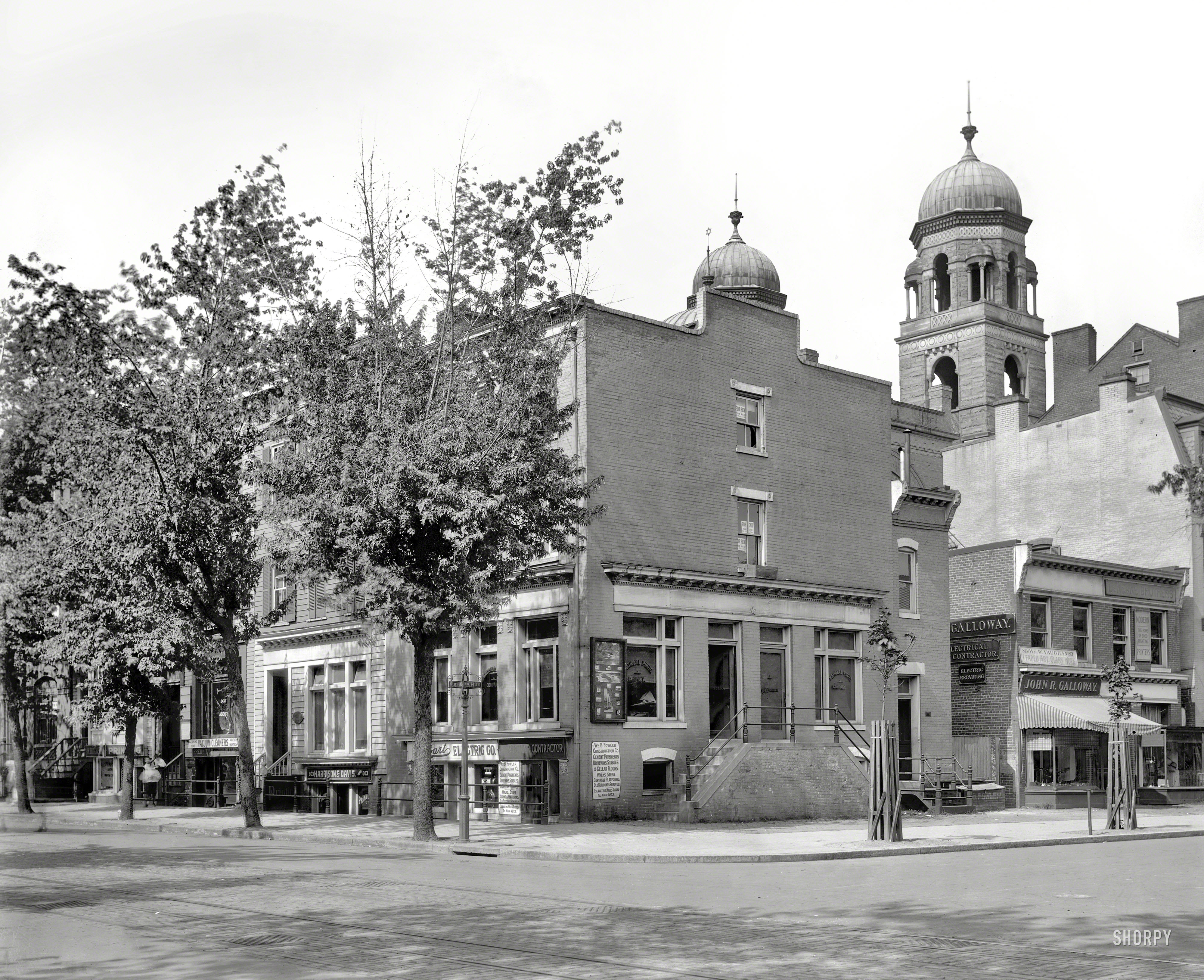 Washington, D.C., circa 1920. "9th & H Streets N.W." Home to the National Photo Company, whose work is well represented here on Shorpy, and whose neighbors we've seen here and here. National Photo Co.glass negative. View full size.