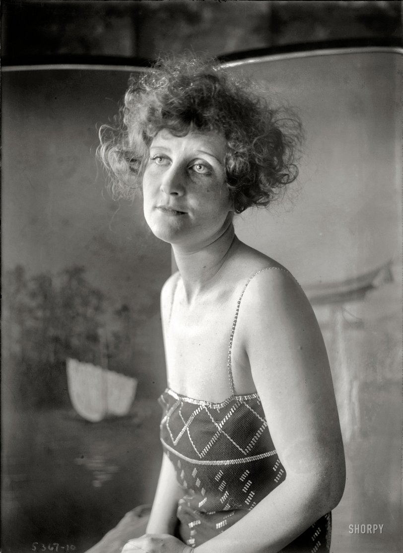 New York circa 1920. One of six similar Bain News Service portraits labeled "Soot." Who can put a first name to this memorable face? View full size.
